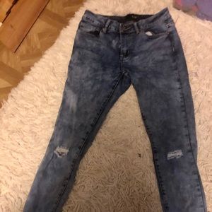 Acid wash ripped jeans